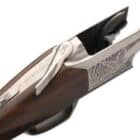 Browning Cynergy Field 12ga 28in over-under shotgun with walnut stock and blued barrel