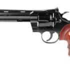 Colt Python 6-inch blued revolver with snake-scale walnut grips